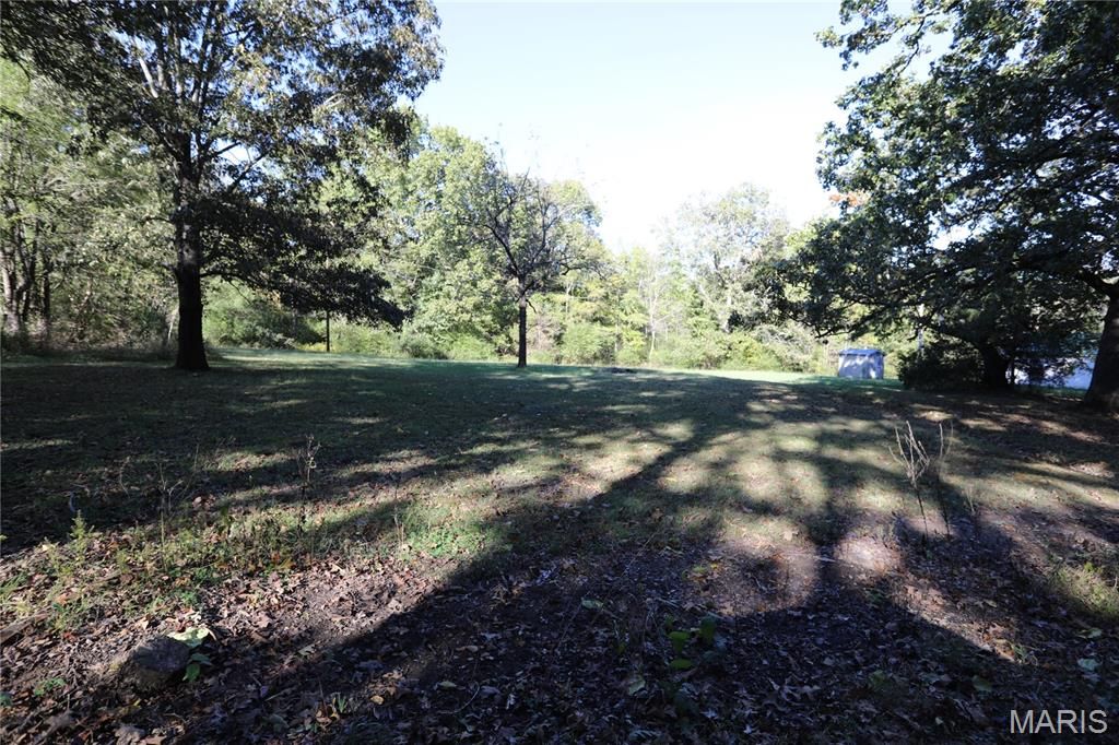 Photo of 3841 County Road 441, Poplar Bluff, MO 63901 (MLS # 25073681)