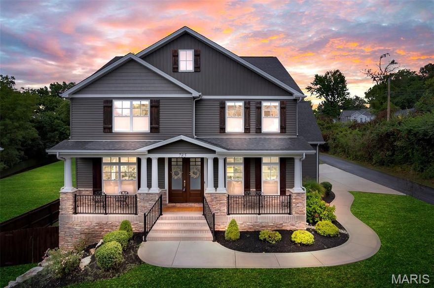 This stunning Des Peres residence perfectly blends style, comfort, and function, offering five bedrooms, 4.5 bathrooms, and a three-car attached garage. Filled with tons of natural light, the main level features a welcoming family room with a gas fireplace, a separate dining room, and a versatile den/office space. The chef’s kitchen is a showstopper, with stainless steel appliances, custom cabinetry, granite countertops, a gas stove, pantry, and a large island with a built-in microwave, plus direct access to the backyard through a French door. Just off the kitchen, a convenient half bath and mudroom/drop zone add everyday ease.

A beautiful staircase leads to the upper level, where four bedrooms await, including an upstairs loft with custom built-in cabinets for storage and a luxurious primary suite with dual vanities, a spacious shower, and dual closets—one a custom-designed walk-in. Laundry is conveniently located upstairs.

The finished walkout lower level offers expanded living with a recreation area, a fifth bedroom with full bath, and ample storage—perfect for guests or multi-generational living. Outside, enjoy a patio, fenced yard, and landscaped outdoor space designed for privacy and entertaining.