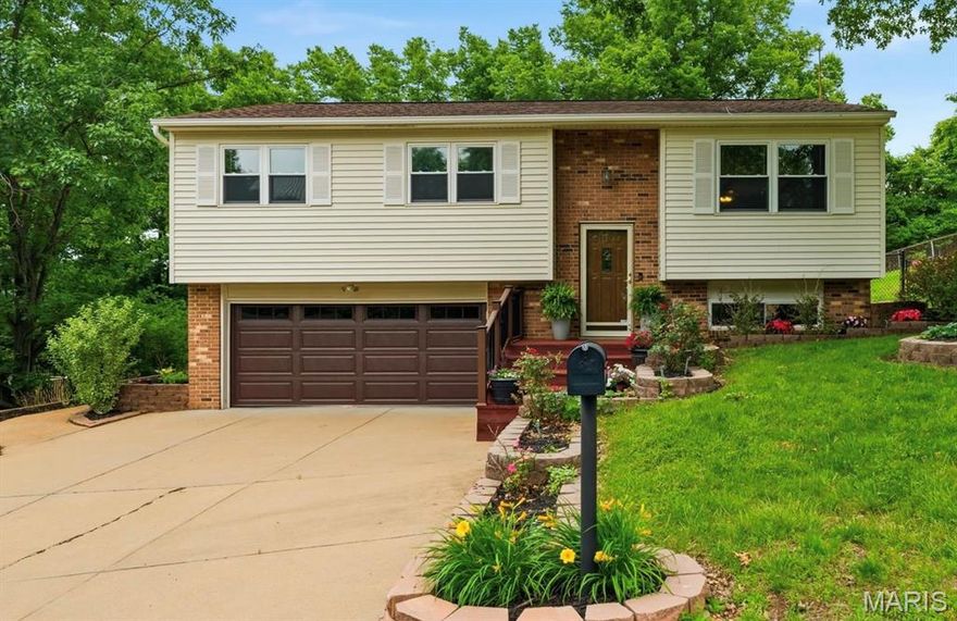 Welcome home to this beautifully updated 3-bedroom, 3-bathroom gem nestled in the heart of Fenton! From the moment you step inside, you’ll be captivated by the stunning custom inlaid hardwood flooring, abundant natural light, and inviting open-concept layout designed for both everyday living and effortless entertaining. The spacious chef’s kitchen is a true showstopper, featuring granite countertops, stainless steel appliances, and an abundance of cabinetry for all your storage needs. Flow seamlessly from the kitchen into the dining and living spaces, then step through the sliding glass doors to your own private backyard retreat. Enjoy a fully fenced, level yard complete with an above-ground swimming pool, peaceful scenic views, and the perfect setting for relaxing summer evenings or weekend gatherings. The main level also offers two generously sized secondary bedrooms, a full hall bathroom, and a spacious primary suite with its own private en-suite bathroom. Downstairs, the finished lower level provides endless possibilities with a large recreation area ideal for a home office, gym, playroom, media room, or additional family space. A third bathroom and utility area with laundry complete the lower level. Car enthusiasts, hobbyists, and DIY lovers will appreciate the oversized two-car garage with extra room for a workshop or additional storage. Conveniently located just minutes from Gravois Bluffs, downtown Fenton, and with quick access to Highways 141, 30, and 55, this home truly combines comfort, style, and convenience in one incredible package. This is one you won’t want to miss—schedule your private showing today!