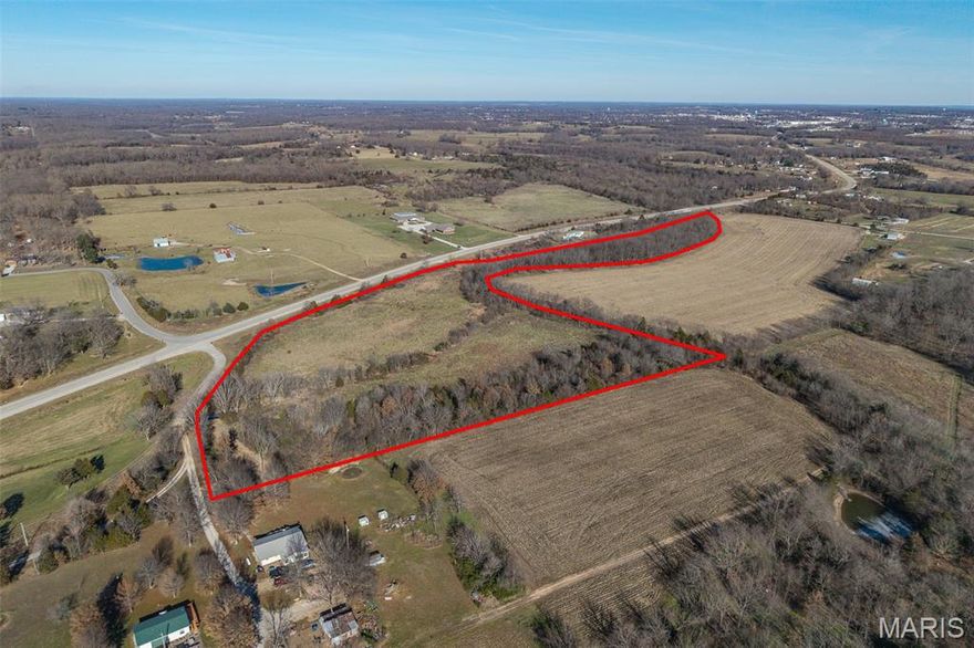 This 20.31-acre property of gently rolling land offers so much potential, with no known restrictions it could be the perfect foundation for your new home. Located just 1.5 miles outside the city limits off E. Hwy 32. Joel E. Barber School district. This land has so much potential for building, farming, hunting or all of the above! Appx 17 of the 20.31 acres are tillable/hay ground-with a light brush clearing more land could easily be tillable. The land was last used for soybeans a few years ago. Wet weather creek runs through the east boundary, there is some existing fencing on the property. && utilities are nearby for easier, more affordable connection.
