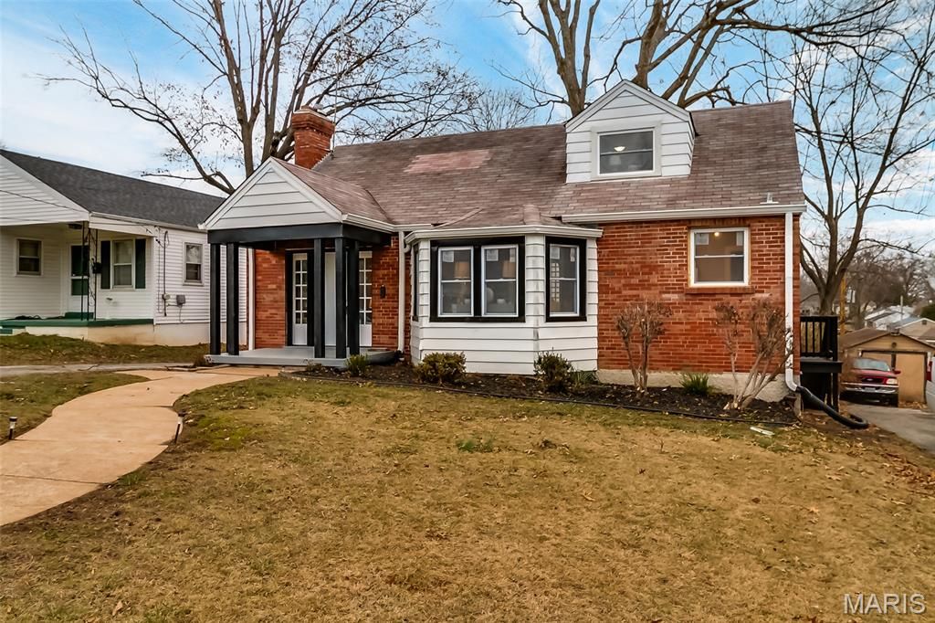 Photo of 216 S Hartnett Avenue, Ferguson, MO 63135 (MLS # 25080891)