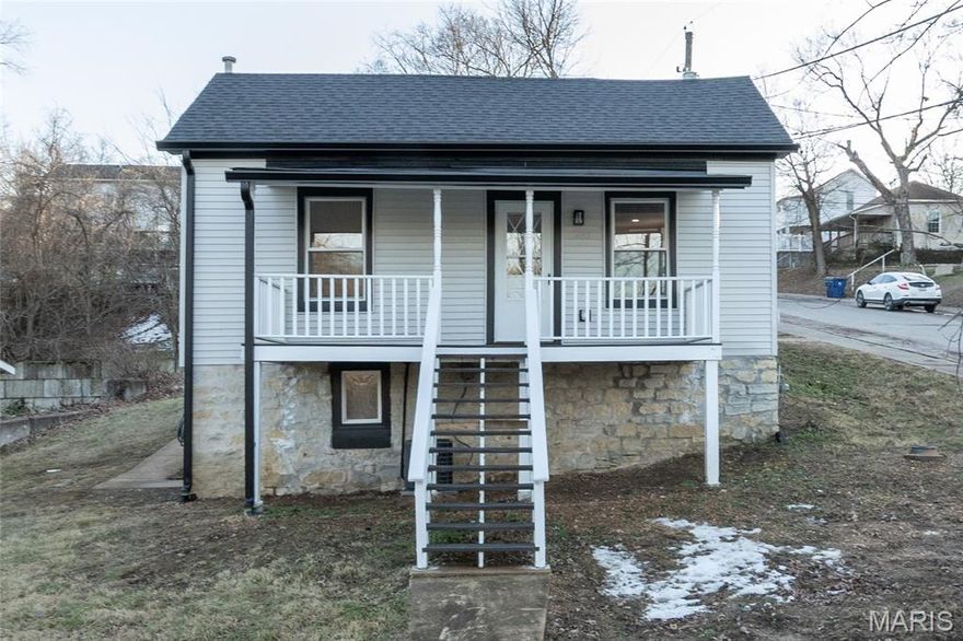 This fully remodeled 2-bedroom, 1-bath home offers a versatile space with a charmingly modern flair.  It’s zoned for both residential and commercial use and creates endless possibilities for homeowners or business owners alike. The home has been completely renovated from top to bottom with extensive updates throughout. Improvements include a new roof, gutters, downspouts and some new siding.  A reimagined main living area featuring a structural beam provides an open concept floor plan. The fully remodeled kitchen and bathroom are just a few of the highlights. The extensive rebuild includes a new band board at the rear foundation wall with new floor joists in the kitchen and bedroom.  The electrical and plumbing systems are new throughout the home.  Additional upgrades include a new heating and AC system, new LVP and tile flooring, additional insulation, new drywall and paint, doors and all new windows. The front porch/deck has also been reinforced with new beams added and the main sewer lateral has been replaced to the city main.  The lower-level features trendy, historic stone walls with a separate room that could be used for utility or storage space.  This rebuilt beauty is conveniently located near the city of De Soto’s main street district.  It’s move-in-ready and blends quality craftsmanship with flexible zoning—perfect for a residence, office, or investment opportunity. Showings begin with an open house on Friday 2/13 4pm-7pm and there is another open house on Sunday 2/15 1pm-3pm.