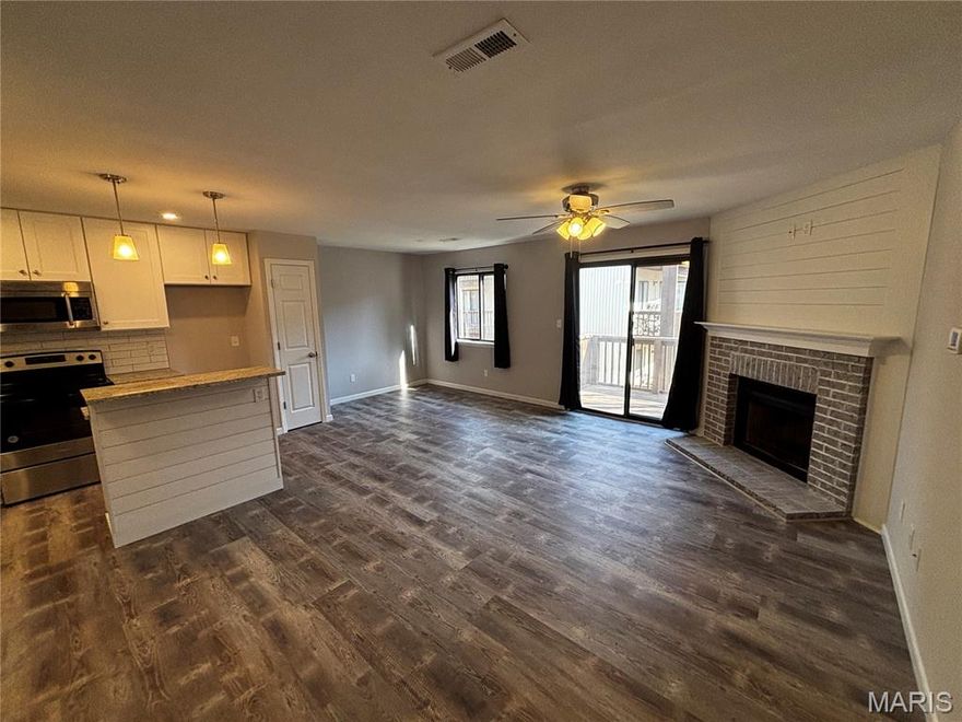 Completely updated 1 bed, 1 bath condo with 736 sqft of modern living space. The kitchen is beautifully renovated with a stylish tile backsplash, solid surface countertops, and stainless steel appliances. Updates continue throughout with refreshed doors, trim, and flooring, creating a clean, contemporary feel. The bathroom has been fully updated with a full tile surround for a sleek, spa-like finish. Move-in ready and turnkey — the only thing left is to make it your own. Perfect for first-time buyers or anyone looking for a low-maintenance, modern home.