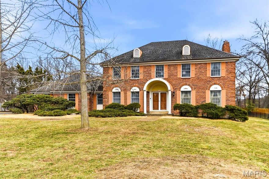 Classic, stately 4-bedroom, 2 1/2 bath two-story home.