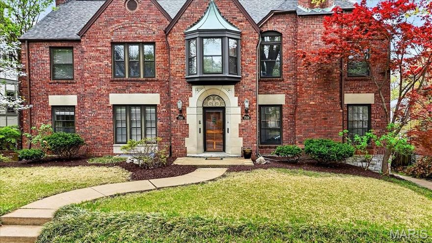 Rarely does a residence of this caliber become available. This exquisitely updated first-floor duplex condo offers 4 bedrooms, 3 bathrooms, nearly 2,700 sq ft of refined living in the highly coveted Moorlands neighborhood, just moments from premier dining, parks, Washington University, and top-rated Clayton schools. Rich in architectural character, the home showcases terrazzo floors, intricate plaster crown molding, wainscoting, stained glass windows, and custom built-ins. The sunken living room, anchored by a striking stone fireplace, flows seamlessly into an elegant dining space, perfect for sophisticated entertaining. The chef’s kitchen is a true showpiece, featuring custom cabinetry, Sub-Zero refrigeration, a Viking gas range, granite countertops, and a designer tile backsplash. The luxurious primary suite offers a generous (14x8) walk-in closet, additional storage, and new wood flooring, complemented by a spa-inspired bath with travertine finishes, a bamboo dual-sink vanity, and an oversized walk-in shower. Two well-appointed guest bedrooms and a full bath complete the main level. The finished lower level expands your living space with a stylish family room, bar/wine room, and a private fourth ensuite, ideal for guests or extended living. Enjoy outdoor space and the convenience of a 2-car attached garage. A perfect blend of historic elegance and modern luxury. This is Moorlands living at its finest.