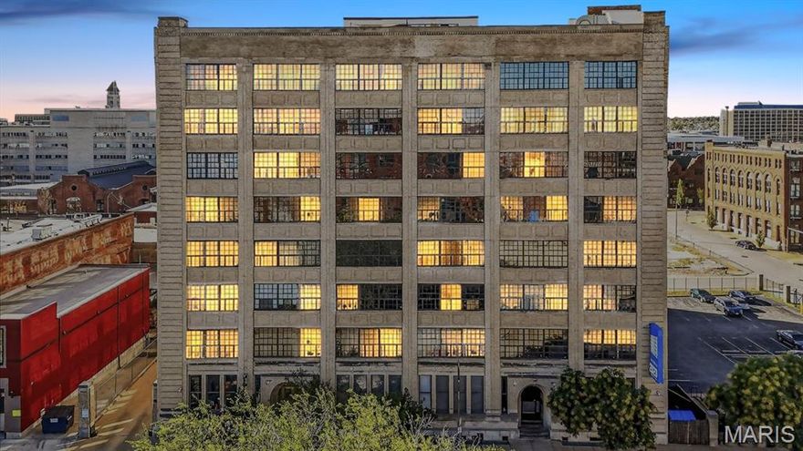 Experience the perfect blend of historic character and vibrant downtown energy in this spacious 2-bedroom, 1-bath loft nestled in the heart of the Washington Avenue Loft District. This thoughtfully designed unit showcases soaring ceilings, exposed architectural details, natural woodwork, and an airy open floor plan filled with natural light that creates an inviting space ideal for both entertaining and everyday living. The kitchen offers generous cabinetry, functional workspace, and included appliances, seamlessly connecting to expansive living and dining areas highlighted by beautiful wood flooring. Both bedrooms offer impressive scale and distinctive loft-style charm, while the full bath and in-unit laundry provide everyday convenience. Residents enjoy secure entry, elevator access, assigned gated parking, and a rooftop deck perfect for relaxing or gathering with friends while taking in stunning city views. Situated just moments from St. Louis favorites, including City Museum, Union Station, Energizer Park, and Enterprise Center, plus popular local breweries and gathering spots like Schlafly Tap Room and Brick River Cider, this loft offers an unmatched opportunity to enjoy walkable urban living at its finest.