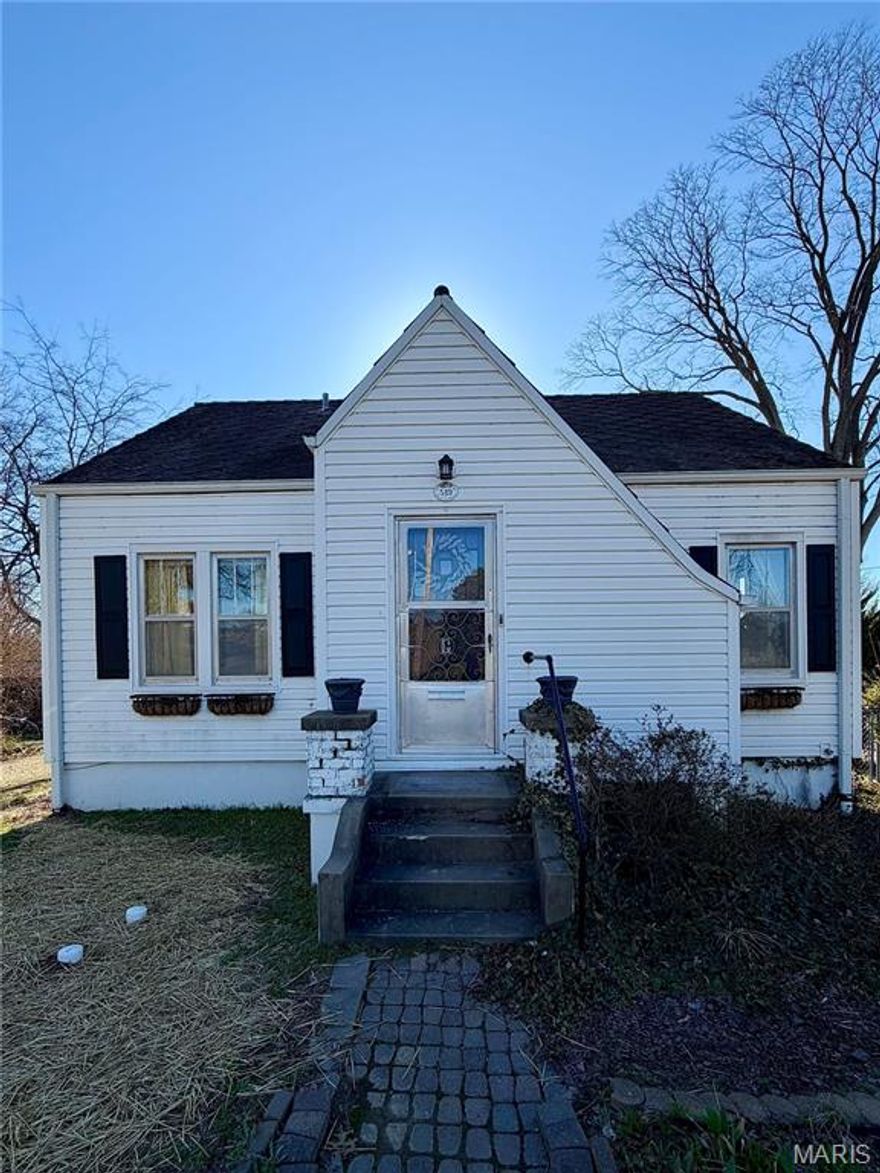 Adorable storybook-style home in the sought-after Sunset area! This charming property features 2 bedrooms, 2 full bathrooms, and a large finished basement with its own kitchen, offering wonderful flexibility for extra living space, entertaining, or potential investment opportunities. Full of character and charm, this home sits in a great location and is the perfect blend of cozy and functional.