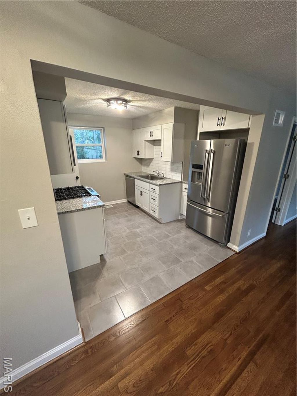 Photo of 8604 Red Bud Avenue, Richmond Heights, MO 63117 (MLS # 25073476)