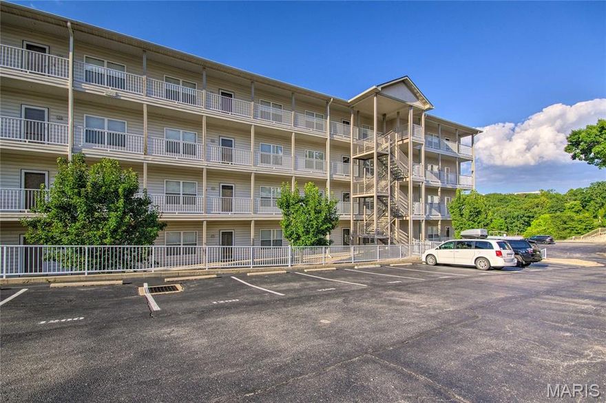 Welcome to Lands End Unit D423 – your slice of Lake of the Ozarks paradise! This rare top-floor end-unit condo offers 3 bedrooms, 3 full baths, and breathtaking main channel views from a covered, and screened deck that feels like an private retreat. With direct ground-level elevator access, this turn-key, fully furnished gem is move-in ready and includes a protected 14x40 boat slip at mile marker 19, shielded by the wave break for easy, worry-free docking. Step inside to an open-concept living space where the spacious kitchen flows effortlessly into the bright living and dining areas. Highlights include a cozy gas fireplace, custom LED accent lighting tucked into the crown molding (wrapping the entry, kitchen, and living room for a warm, inviting glow), and abundant natural light that enhances the home’s welcoming, entertaining-ready vibe. The luxurious master suite features a king bed, stunning lake views, private deck access, a jetted tub, separate full shower, and generous closet. The second ensuite bedroom offers a queen bed and its own full bath for added privacy and comfort. The third bedroom, perfect for additional guests, includes two twin beds, with the third full bath conveniently located just across the hall. A full-size washer and dryer in the dedicated laundry room adds everyday convenience. Resort-style amenities elevate your lifestyle: a lakefront pool, relaxing lazy river, state-of-the-art fitness center, clubhouse, and playground – all near your doorstep. Whether you're envisioning a full-time residence, weekend escape, or high-performing property, this great unit checks every box. Its prime location puts you minutes by land or water from the exciting new Oasis Amusement Park (set to open soon), the upcoming Bass Pro Shops anchor at the Osage Beach Premium Outlets, top-tier dining, shopping, and endless Lake of the Ozarks adventures. Experience the perfect fusion of luxury, convenience, and lakefront living at Lands End Condominiums.