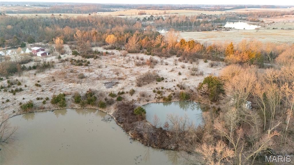 Photo of 25764 Hopkins Rd, Perry, MO 63462 (MLS # 26013695)