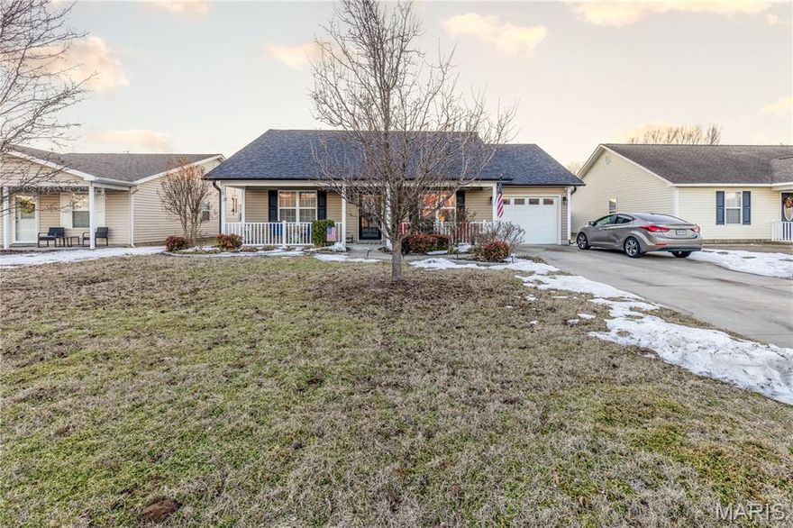 This well-maintained 3 bedroom, 2 bath home features an open-concept layout with vaulted ceilings and gorgeous cabinetry, creating a bright and welcoming living space. A fully insulated single-car garage offers year-round convenience, while the screened-in back porch with privacy fence is perfect for relaxing or entertaining. The property also includes a 10x16 storage building for added functionality. For added peace of mind, the home is equipped with timed front exterior lighting and an installed alarm system. Located in a fully developed neighborhood just off the beaten path, this home provides the convenience of being in town without the feel of town. A brand-new roof installed just months ago adds peace of mind for the next owner. Move-in ready and exceptionally maintained — schedule your showing today.