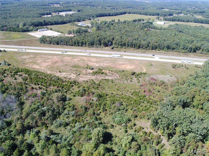 Endless potential with this 58 +/- acre parcel!  This property has 1320 +/- feet interstate frontage with excellent visibility from both east and west bound lanes of I-44.  Conveniently located just outside Cuba, this property offers potential for commercial, agricultural, or residential development.