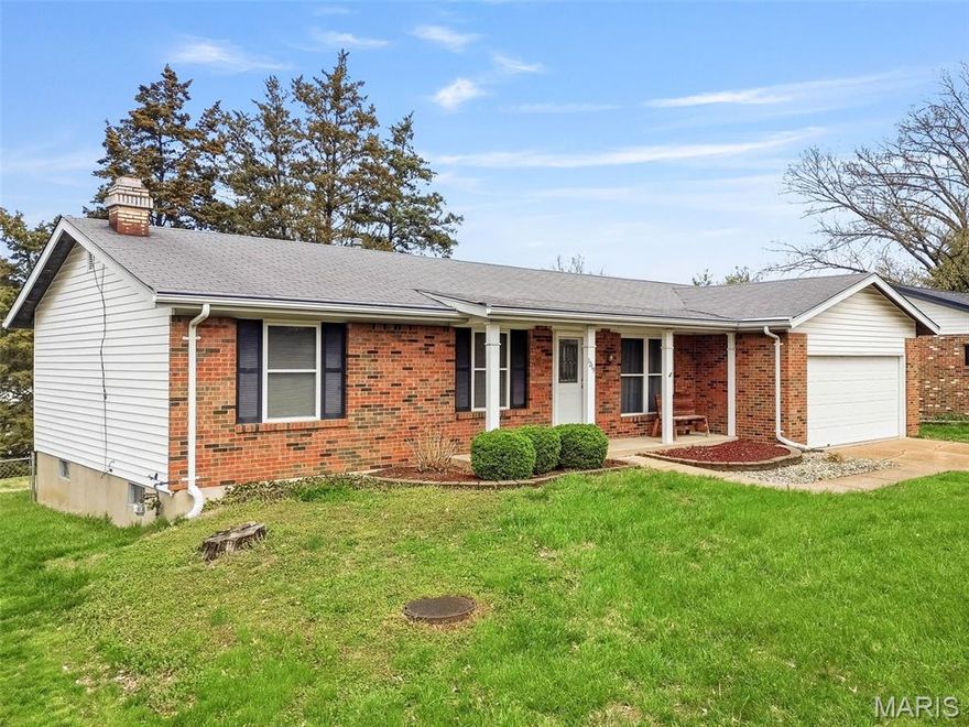 Welcome home to this impeccably maintained 3-bedroom, 2-bath home offering approx 1900 square feet of comfortable living with exceptional curb appeal and a charming covered front porch. Inside, you’ll find beautifully refinished wood floors throughout the living room, kitchen, family room, hallway, and bedrooms, complemented by tile flooring in both bathrooms. The open floor plan creates a seamless flow, anchored by an updated kitchen featuring quartz countertops, updated appliances, and a new electric stove (2025). The primary suite includes a private full bath, while the additional hall bathroom was tastefully updated in 2022. The partially finished lower level adds valuable living space with a cozy wood-burning fireplace—perfect for relaxing or entertaining, and workbench. Step outside to enjoy the patio and a peaceful backyard offering privacy and a serene setting. Attached oversized 2 car garage. Additional updates include a newer furnace (approx. 4 years), new water heater (2025),all windows have been replaced. Washer and dryer stay. Chadwick Club pool summer membership approx $325. Meticulously clean and truly move-in ready—this home is a must-see!