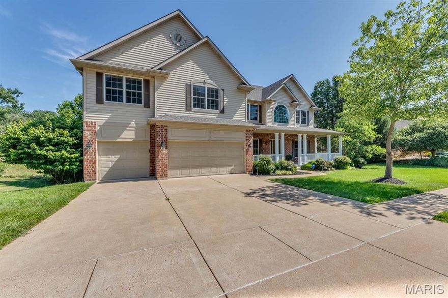 This impressive 5 bedroom, 4 1/2 bath two story is nestled on a premium lot backing to wooded common ground. Pass the charming covered front porch, the wooded entry provides open views of the formal living areas accented with wainscoting and crown molding.  The living room leads to the family room with a gas fireplace & 5 window bay, The well- appointed kitchen has 42 'cabinetry, granite counters, wood floors, island/breakfast bar, a walk-in pantry & opens to the hearth room featuring a second gas fireplace. Access the18 x10 composite deck from the breakfast room. The main floor laundry room is complete with an oversized washer/dryer & utility sink. The rear staircase leads to a huge master suite that is separated from the other bedrooms and offers a luxury bath with jet tub/shower, water closet, dual vanities. 3 bedrooms with private baths & a loft complete this floor. The lower level has an office (5th bedroom) full bath, rec room with wet bar. Updates and upgrades include new paint & carpet throughout 06/2025, newer HVAC system installed in 2022, roof 2015, zoned heating/cooling, lawn sprinklers system, 9ft ceiling on main floor and basement. This home was built by Fischer & Fritchel.