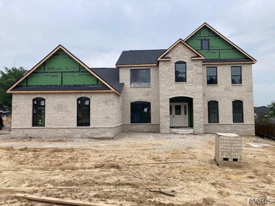 Spectacular, custom built, new construction by Genesis Development in Des Peres! This stunning home will wow you inside and out by showcasing todays most desired features and finishes. This open and smart floor plan flows beautifully and offers impressive room sizes and efficient use of space.  Features include 5 bedrooms, 4.5 bathrooms, 5,104 sq ft of dynamic living space (inc the finished lower level), a main floor Primary Suite, on-trend Kitchen, large island, gas cooktop, double ovens, beverage station, custom millwork, smart home system, Hi effic gas furnaces, gas fireplace, luxurious bathrooms, finished basement with tall pour, lower level wet bar, exquisite brick and stone facade, carriage style garage doors, side entry 3 car garage and more. Enjoy nearby parks, restaurants, quaint shops and easy access to Whys 270,40/61 and I-44. Lambert Int airport is a short commute away. Amazing home, beautiful finishes, desirable Kirkwood schools. Scheduled for Summer 2025 completion.
