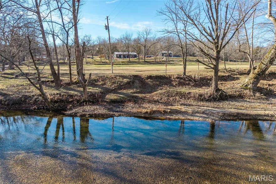 Unrivaled potential and intriguing history meet natural beauty in this gorgeous riverfront property spanning over 22 acres, situated directly on the Nigangua River.  This 3-bedroom, 2-bath property with RV Hookups and more offers effortless river access, a piece of history with the Corkery bridge piers, a shoreline perfect for launching canoes, rafts, and kayaks, and is uniquely positioned to transition into a profitable business with so much potential.  Don't miss your chance to own a significant piece of waterfront property on the Niangua River!  Whether you're looking for ultimate privacy or a future business venture, this one delivers!
