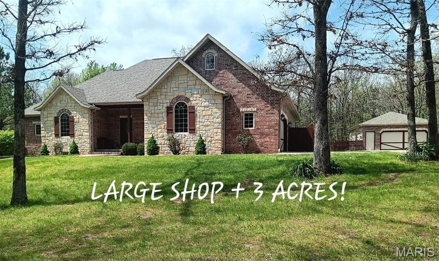 WELCOME to PARADISE nestled in the woods in a PARKLIKE SETTING only 2 MILES FROM TOWN and I-44! Making it an EASY COMMUTE TO FT. WOOD OR SPRINGFIELD. This CUSTOM BUILT, ONE OWNER with  NEW SHINGLES JUST INSTALLED IN 26, offers over  4900 SF ML HOME on situated  on  3 acres PLUS a LARGE, HEATED 24X36 SHOP with ATTACHED 9X24 TRACTOR SHED! This beautiful home has a VERY OPEN MAIN LEVEL WITH 2 MASTER SUITES (OR 1 MASTER/1GUEST) each with walk-in showers, large closets, and one has a JACUZZI TUB! The Great Room has a MASSIVE CATHEDRAL CEILING and AWESOME STONE SEE-THROUGH PROPANE FIREPLACE! The DINING ROOM/HEARTH ROOM shows the other side of the fireplace and opens up into the LARGE KITCHEN WITH BEAUTIFUL CUSTOM CABINETS with WHIRLPOOL STAINLESS STEEL APPLIANCES including DOUBLE OVEN AND JENN AIR GRILL! Also a HOME OFFICE, LAUNDRY ROOM, PANTRY, SPARE BATH, AND GREAT OPEN VIEWS! Upstairs there’s a LARGE BONUS ROOM that could be an extra bedroom, family room, or office!  The OPEN STAIRCASE LEADS DOWNSTAIRS TO THE LARGE SPORTS ROOM WHERE THE POOL TABLE and air hockey table are located!  Also a separate MEDIA ROOM FOR THE BIG SCREEN TV AND SURROUND SOUND and a room for your exercise equipment! Down the hall you will find 4 LARGE 
BEDROOMS WITH WALK IN CLOSETS THAT HAVE QUEEN BEDS and one has A KING BED!  Also 1 FULL BATH, 1 HALF BATH, HVAC ROOM, AND TORNADO SAFE ROOM! This is a WALKOUT BASEMENT and ALL BEDROOMS HAVE WINDOWS! The LANDSCAPING IS BEAUTIFUL! GREAT LOCATION NEAR THE HOSPITAL AND SCHOOLS! 6 ADDITIONAL ACRES AVAILABLE for added price! DON’T MISS YOUR CHANCE TO OWN THIS ONE OF A KIND PIECE OF TRANQUILITY!  ****  NEW SHINGLES INSTALLED IN 2026 !! ++++++