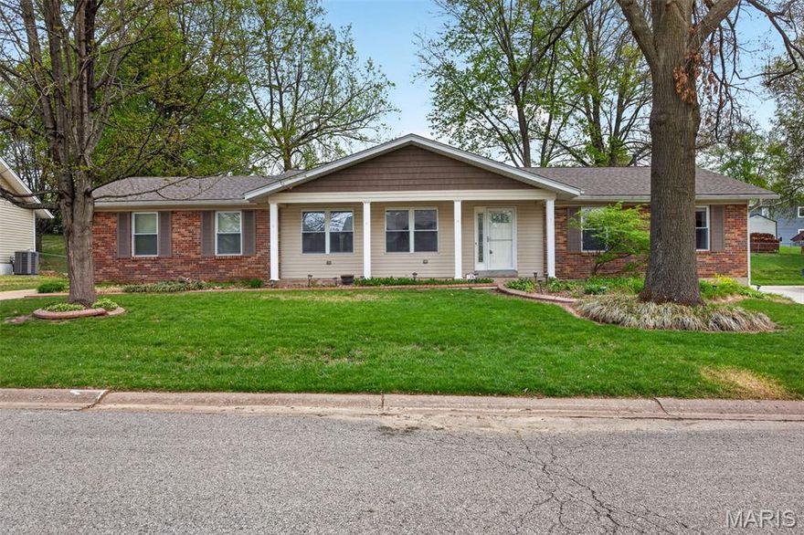 Welcome Home! Over 3000 sq ft of living space in this open floor plan ranch in the heart of St Peters in Francis Howell Central schools with easy access to highways, shopping and restaurants! This 3 bedroom 2 bath ranch with 2 car rear entry garage is settled on a quiet street with mature trees. Step inside and notice the wood plank flooring that carries through the main level living space. A front flex room is perfect for a home office, formal living or dining room or play room! The huge great room with brick fireplace opens to the spacious kitchen and breakfast room. A great update off the kitchen offers a main floor laundry room with great custom cabinetry and amazing natural light. Easy access through atrium and kitchen doors to the rear end garage, and partially fenced backyard with patio. Down the hall you will find a spacious primary suite with dual closets and ensuite full bath. The two secondary bedrooms share the hall bath. Down the open spindled staircase to the partially finished LL with new can lighting and neutral paint. There is plenty of storage in the utility room with built in shelving and second laundry hookups. Carpets and home have been professionally cleaned. This home is ready for its new owners to move in and enjoy!