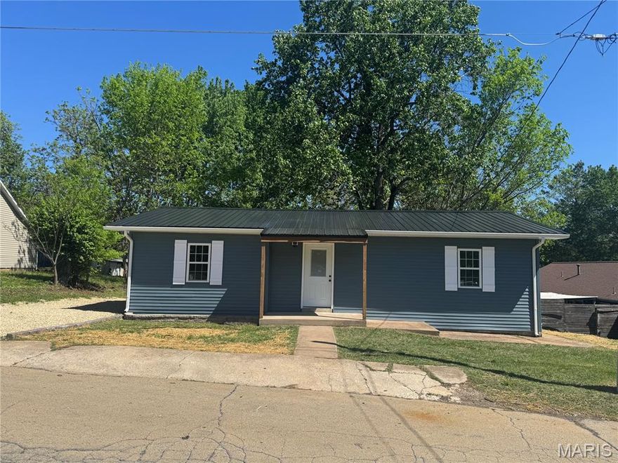 Cute completely remodeled 3 bedroom home that sits on a small basement for storage and storm shelter.... beautiful new covered deck off the kitchen with a gorgeous view of large back yard.... new siding, new roof, new windows new hvac, new kitchen, bath, new lighting....everything NEW!   Call today to schedule a tour!