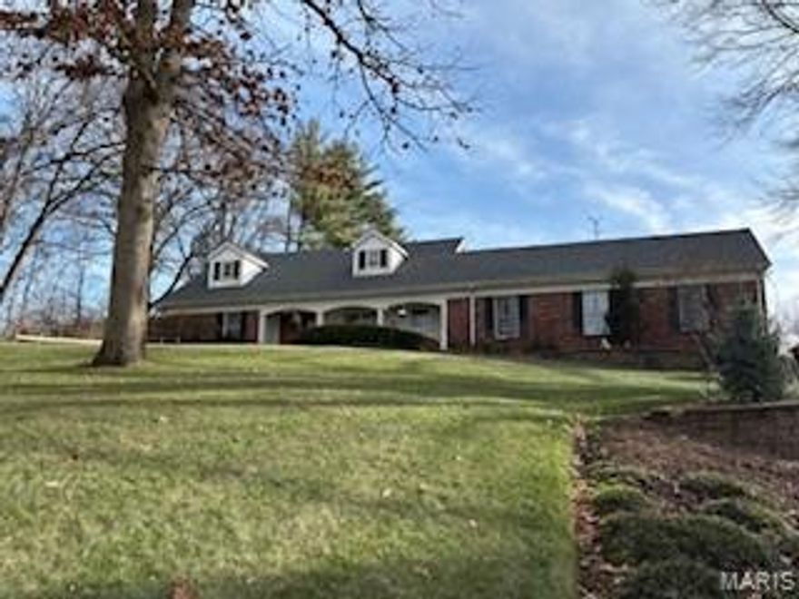 Rare 3-acre property in the heart of West County with endless possibilities! Located off Barrett Station Road in the desirable Parkway School District, this 4-bedroom, 3.5-bath home offers space, privacy, and convenience. The main level features a mix of gleaming hardwood floors, ceramic tile, and carpet, along with a spacious kitchen boasting a center island, granite countertops, and stainless steel appliances. Two bedrooms are located on the main level, while two additional bedrooms upstairs—also with beautiful hardwood floors—make this layout ideal for families. Relax in the inviting living area with a gas fireplace, or step outside to a large patio perfect for entertaining or enjoying the serene surroundings.
The oversized 3-car garage and expansive parking area provide plenty of room for vehicles and guests. Outdoors, the property includes a horse barn with two 12' x 12' stalls, fenced pasture, and an in-ground sprinkler system to keep the grounds lush. A new roof installed in 2025 adds peace of mind.
The partially finished lower level offers a recreation area, additional sleeping space, a cedar closet, and a pool table that stays with the home. This unique property is ideal for those seeking a private retreat, equestrian lifestyle, or an outstanding opportunity to build your dream home on a rare 3-acre lot in Ballwin. Conveniently located near highways, shopping, and dining, this home combines country charm with city accessibility. Don’t miss your chance to own this exceptional property!