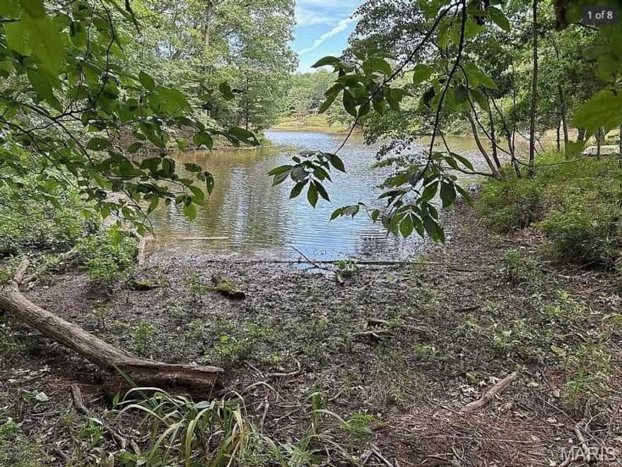 Lot 8 in Mark’s Crossing Subdivision offers a rare opportunity to build your custom LAKESIDE home in a peaceful country setting. Enjoy lake access with the ability to build YOUR OWN DOCK, creating the ideal space for recreation and relaxation.
Public water, electric, and fiber-optic internet are available. Building requirements include a minimum of 1,800 sq ft for a one-story home. Located in unincorporated Warren County within the Warrenton School District.
Bring your own plans and builder. No trailers, double-wide, or modular homes allowed (see MLS documents for full indentures and restrictions).
Conveniently located just minutes from shopping, dining, and I-70 access, this property offers the perfect balance of privacy and accessibility.
Bonus Opportunity: Two additional parcels in Mark’s Crossing are also available (MLS #25069553), presenting options for expanded development, investment, or creating a private estate. Builders—make your mark in this exclusive subdivision.
This is your chance to build your dream home in a scenic setting—schedule your visit today!