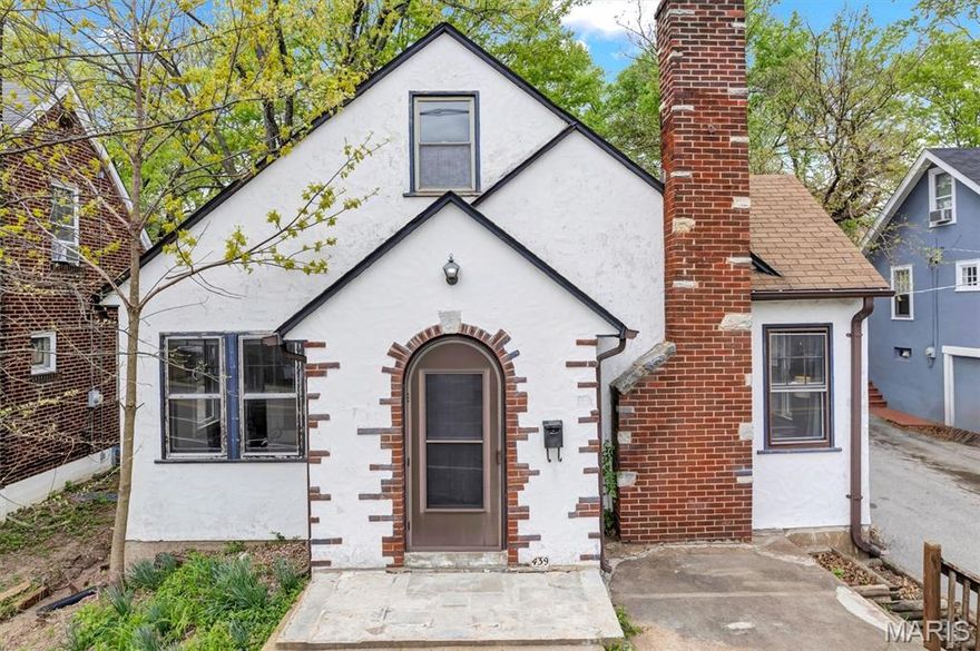 Experience the perfect blend of comfort and character in this charming ranch-style home located in the heart of Webster Groves. This residence features a bright and inviting living room anchored by a cozy fireplace, leading into a separate dining room ideal for hosting dinner parties. The kitchen is equipped with a gas stove for the home chef, while the primary bedroom is conveniently situated on the main floor. Beautiful details and a functional layout make this home feel both spacious and intimate.
The lower level offers a versatile unfinished basement that includes a dedicated laundry area, a workshop for DIY projects, and a family room perfect for a home gym or hobby space. Outside, the property boasts a long driveway leading to a detached two-car garage, providing ample parking and storage. Situated in a prime Webster Groves location, you are just minutes away from local parks, boutique shopping, and top-rated dining. This move-in-ready ranch is a fantastic opportunity to own a piece of one of St. Louis's most sought-after communities