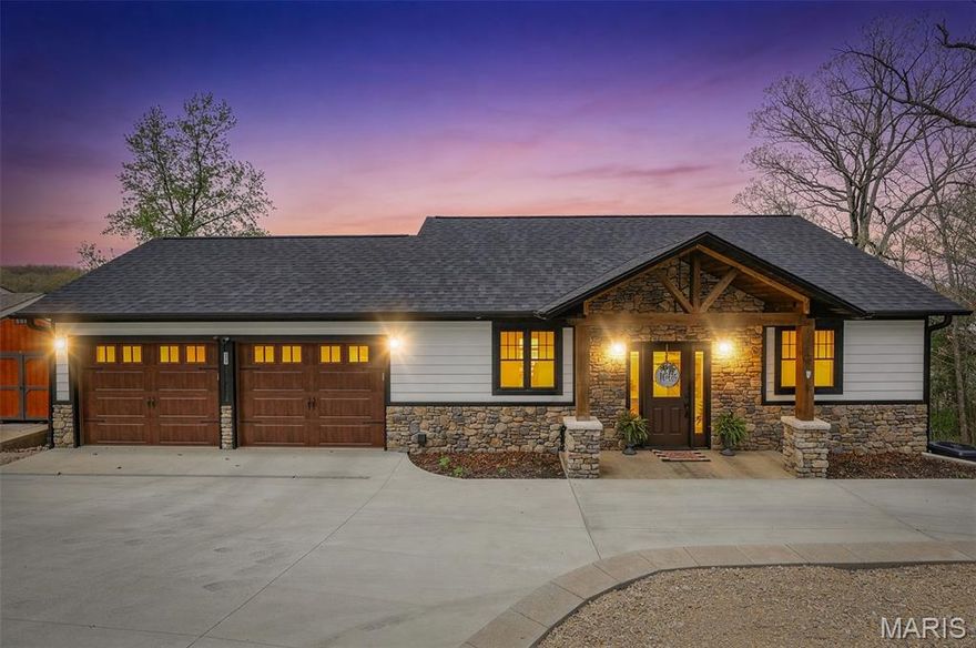 Your 2025-built lake home at Terre Du Lac is ready just in time for summer. Perfectly positioned on Lac Carmel, a peaceful 58-acre lake with a 9.9 HP limit, this property offers stunning water views and the ideal blend of modern comfort and lake-life relaxation.
This beautiful home features 3 bedrooms, 2.5 bathrooms, and a 2-car garage, along with two covered decks overlooking the lake—perfect for morning coffee, sunset watching, or weekend gatherings. The main-level bedroom takes full advantage of the setting with lake views, and a private bathroom complete with a walk-in shower featuring three shower fixtures.
The finished lower level expands your living space with a family room and a bonus room, offering flexibility for guests, hobbies, or entertainment. Outside, enjoy a circle concrete drive, a cozy firepit, and your own dock, making lake days effortless and fun.
If you’ve been waiting for the perfect lake home for summer, this one delivers everything you’ve been hoping for.