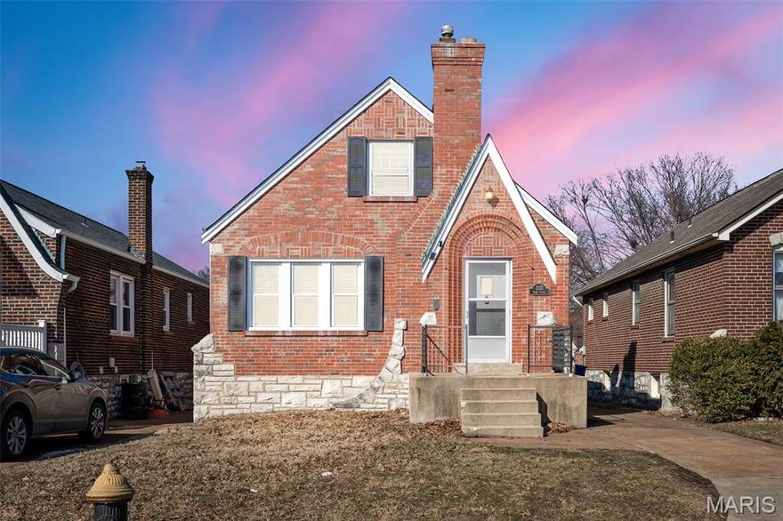 Spectacular and truly rare opportunity to own this charming gingerbread-style home. This residence showcases remarkable original character throughout, including stunning stained glass windows, coved ceilings, graceful archways, beautiful hardwood floors, classic tilework, and original baseboards. The home offers a surprisingly functional and open floor plan that blends historic charm with everyday livability. Just off the kitchen, you’ll find a quaint 12’ x 7’ sunporch—perfect for morning coffee, casual dining, or relaxing year-round. The level yard features a patio ideal for entertaining, along with a one-car detached garage. 
The walk-out basement offers a clean and inviting lower level with a beautiful exposed stone foundation, perfect for a recreation room, hobby space, or additional living area. The main floor has new windows and newer kitchen appliances. The upstairs level has never been finished or lived in and presents an exceptional opportunity to expand, with a bathroom rough-in, striking exposed brick walls and a gorgeous wood ceiling that could add hundreds of square feet of additional living space. Located just two blocks from Carondelet Park, this home is in fantastic condition and offers a rare combination of character, potential, and location.  A truly special property that must be seen to be fully appreciated.