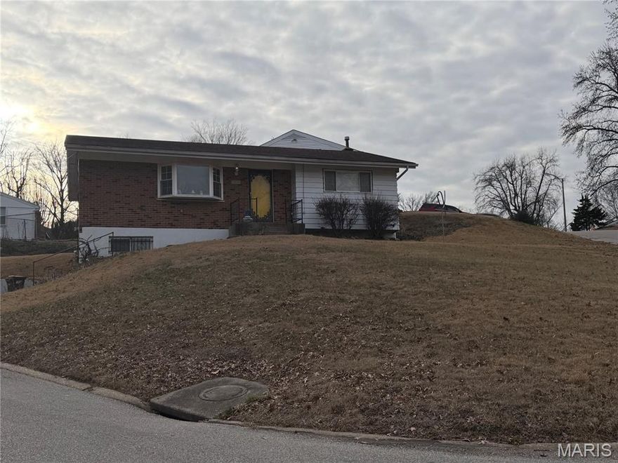 charming ranch-style home offering timeless appeal and great potential! This well-situated property features 3 bedrooms and 1.5 baths with approximately 1,148 sq. ft. of living space on a generous lot. The functional layout provides comfortable living spaces ready for updates or personalization to meet your vision. Enjoy the convenience of an attached garage, brick exterior, and classic ranch design. Ideal for investors, first-time buyers, or those seeking a value-add opportunity in the 63121 area. Don’t miss your chance to make this property your own!