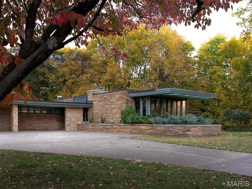 1952 mid-century prairie-style ranch by John Boardman on 3+ private acres.
For your consideration, this architecturally significant, 1952 mid-century prairie-style ranch by noted
local architect John L.E. Boardman. Set privately among mature trees on over three acres within the
Alma Schrader school district, now available for the first time in many years. Reflecting classic
mid-century principles with original architectural details preserved throughout.
Spanning 4,500+ sq ft, the single-level home includes four bedrooms, three full bathrooms, two
dining areas, two sitting rooms and a wet bar. Stone surfaces extend from exterior to interior, while
terrazzo floors and wood carsiding ceilings run throughout the living areas. Large windows, some
wall-spanning, others clerestory, flood the home with natural light and frame views of the wooded
property. Bringing the outdoors in, the formal dining room features a 19ft long raised indoor garden.
Original built-ins include three built-in sofas, extensive custom cabinetry and storage closets, and a
dedicated wine storage cabinet. Two gas fireplaces anchor the main living spaces, and mini-split
systems provide heating and cooling to primary areas. Restoration efforts have reintroduced
previously concealed windows, preserving the home’s architectural intent while leaving
opportunities for thoughtful continuation.
Outdoors, the property features an original concrete swimming pool, fenced in backyard and an
outbuilding with attached lean-to for mower and equipment storage. Approximately 1/4 mile from
Kiwanis Park, this estate offers rare privacy within city limits.
At the property line is a small historic home on a separate nearly one-acre parcel, available for
purchase separately.