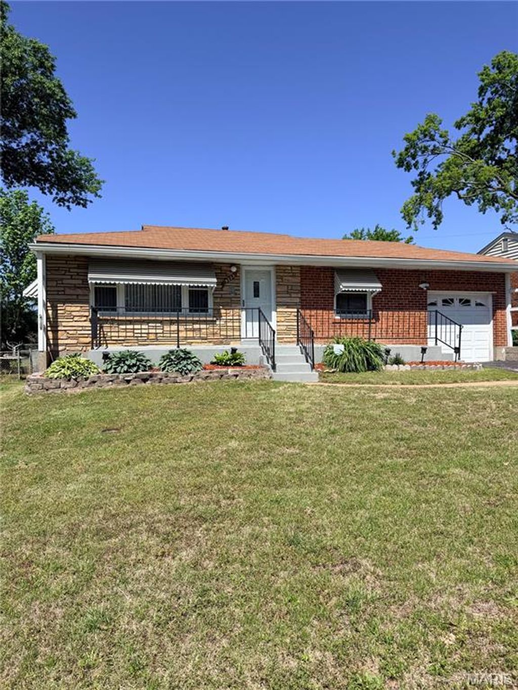 Photo of 9233 Edna Street, Riverview, MO 63137 (MLS # 26028502)