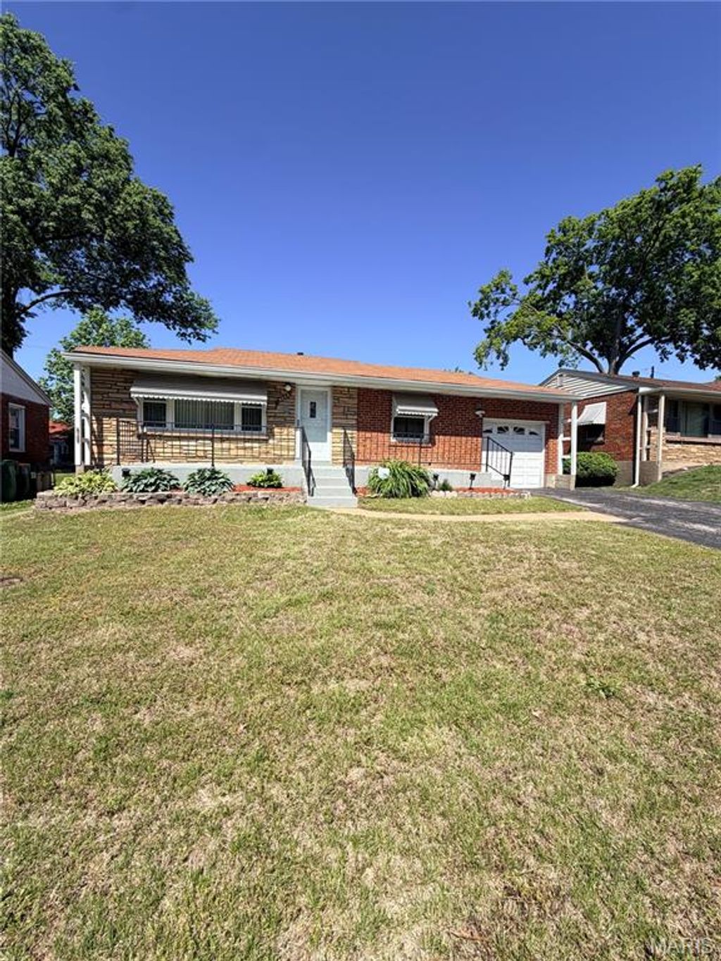 Photo of 9233 Edna Street, Riverview, MO 63137 (MLS # 26028502)