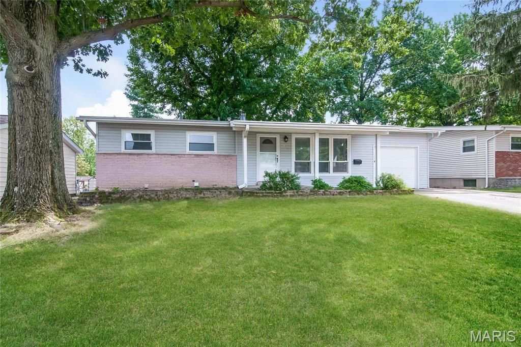 Photo of 702 Lynn Haven Lane, Hazelwood, MO 63042 (MLS # 25073587)