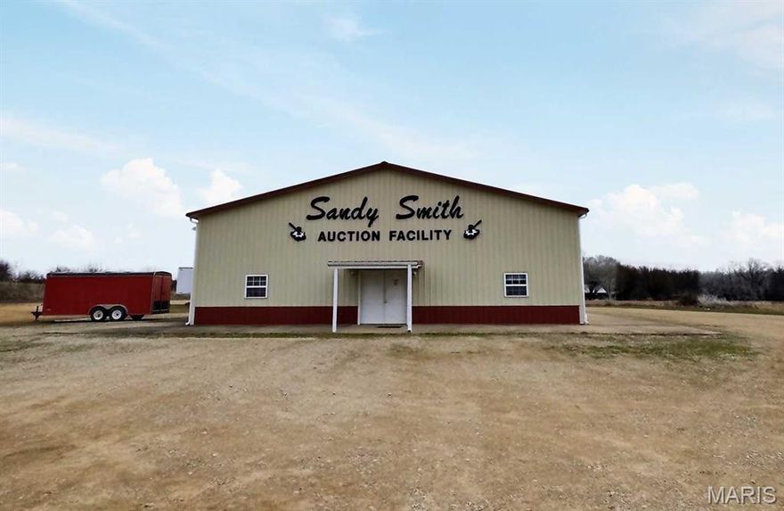 Multi-Use / Commercial Opportunity just outside Puxico, MO! This 5,000 sq ft all-metal building sits on 6 acres and is currently operating as an auction service. The possibilities for this property are endless. The fully insulated structure features 3 overhead doors, abundant lighting, and a 12' concrete apron on all sides for easy access and loading. Inside you’ll find 4,500 sq ft of heated open floor space plus a 500 sq ft heated and cooled office/lounge area with a private bath. Additional amenities include two public restrooms and a kitchen/food prep area. Ideal for retail, warehouse, event space, manufacturing, or service businesses. Excellent layout, great access, and room to grow! Only 3.5 miles south of Puxico, on State Highway 51. Schedule your private tour today!