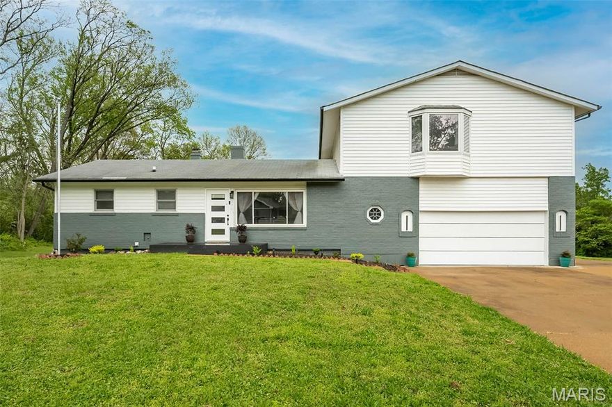 Beautifully updated 5 bed, 3.5 bath home in highly sought-after Westridge subdivision, set on nearly .7 acres of level, usable yard and located in the award-winning Parkway School District! This stylish home offers a versatile floor plan with 2 bedrooms conveniently located on the main floor, along with bright, open living spaces and stylish updates throughout. The fully renovated kitchen features sleek quartz countertops, updated cabinetry, and stainless steel appliances, flowing seamlessly into the main living areas with newer flooring, modern lighting, baseboards, doors, and fresh paint. Upstairs, you’ll find 3 additional bedrooms, including an expansive primary suite with impressive space, flexibility, and a delightful bathroom. The updated bathrooms showcase beautiful porcelain tile finishes! The partially finished lower level provides the perfect second living area, rec space, or retreat anchored by a wood-burning fireplace. Enjoy outdoor living on the deck overlooking the large grassy backyard. Storage shed with upper-level loft for added functionality. Additional highlights include main floor utility room, a spacious garage with 3rd parking pad and EV charging station, and newer HVAC! Washer & Dryer included. A rare blend of space, updates, and lot size in an unbeatable location!