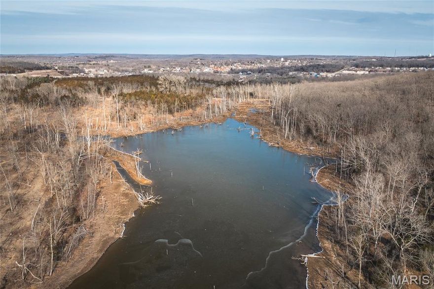 Tract 1- An extraordinary opportunity to own 86 +/- acres of land centered around a breathtaking 12-acre private lake. This unique property offers a rare combination of scenic beauty, seclusion, and exceptional development potential. Located just minutes from the heart of Potosi, MO.

The lake serves as the focal point, with rolling terrain surrounding it and multiple elevated build sites offering incredible water views—perfect for a dream home, guest houses, or a private retreat. Located just off the main drive on the left, the lake provides easy access and creates a picturesque setting unlike any other.

Ideal for an estate, recreational getaway, or income-producing venture such as rentals or a lakeside development, this property is well-suited for a variety of uses including fishing, hunting, and outdoor recreation.

Utilities are already in place with electric service near the entrance, and two natural springs add to the land’s natural charm and sustainability.

With its combination of water features, build potential, and privacy, this one-of-a-kind property is ready for your vision. Opportunities like this are truly rare. Additional acreage available (Tract 2 - 70 +/- acres)