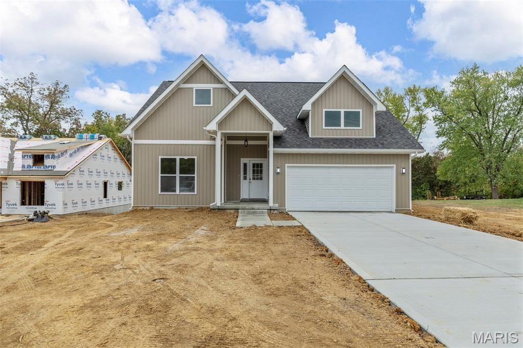 Photo of 630 W Booneslick Road, Warrenton, MO 63383 (MLS # 25079851)