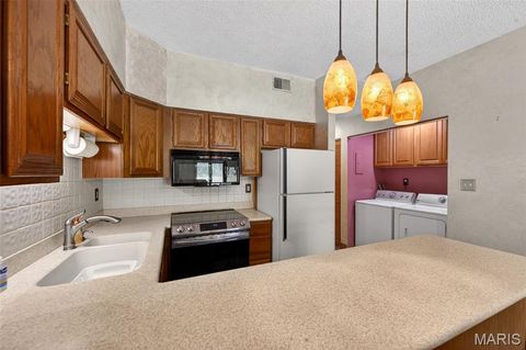 Tiny photo for 13818 Amiot Drive #A, Maryland Heights, MO 63146 (MLS # 26030811)