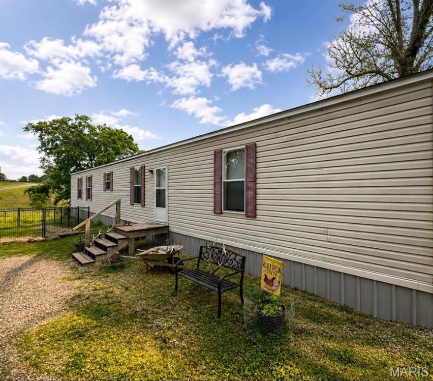 Very attractive 3 bedroom, 2 full bath home, new granite counter tops, on 8 ac. m/l, fenced, small cabin on property, dog kennel, chicken coop, plenty of room for a couple horses and sheep. So much to offer with this home. Call to see this property.