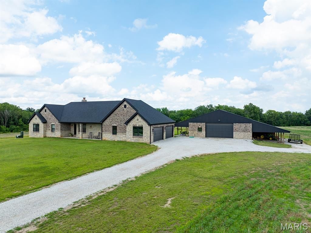 Photo of 27650 Iowa Road Rd, Perry, MO 63462 (MLS # 26013240)
