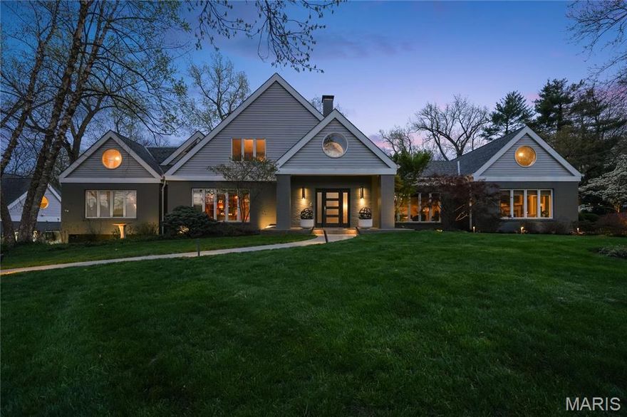 This one-of-a-kind contemporary gem in the heart of Ladue boasts unique architectural features and sits on a lushly landscaped 1.42-acre lot with a swimming pool, outdoor kitchen, hot tub, and water feature. With approx. 6190 SF of living space, it offers comfort and style. Above the garage, a remodeled 1-bedroom, 1-bath apartment is perfect for guests or family, featuring a living room, dining room, kitchen, and laundry. The light-filled primary suite has a custom closet and luxurious bath with porcelain tile, a dual walk-in shower, and a separate steam shower. A 7-car garage caters to car enthusiasts, with a detached 4-car garage, w- a fifth lift, plus an attached 2-car garage. The gourmet kitchen includes granite countertops, custom cabinetry, and top-tier appliances. Other features include a great room with a wet bar, an office with built-in cabinetry, and a finished LL with a rec room.  Close to public and private schools, and convenient to Hyws, shopping, and Clayton.