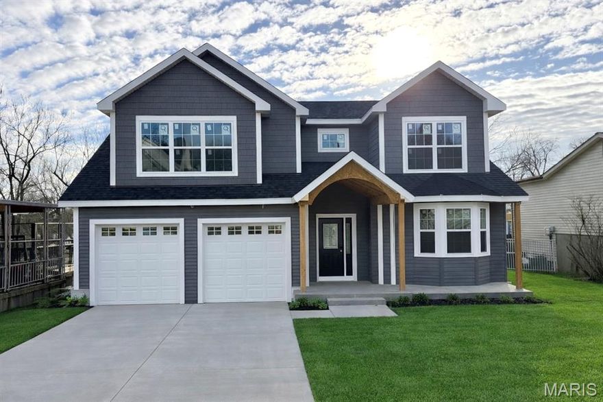 More Photos coming soon. Welcome Home to your brand new, expertly built, 2 story, custom built home with 5 bedrooms and 5 1/2 bathrooms. Walking through the stately wood entry door opens up to a spacious foyer and open floor plan with plenty of recessed lighting throughout. Centered are expansive sliding doors and windows lighting up the home naturally. Beautiful wood flooring through out this home sweeps through the sitting room, dining room, large living room- adorned with a gas log fireplace and spectacular high end kitchen. A chefs dream for family gatherings and entertaining. Designer custom cabinetry, luxurious quartz countertops, soft close drawers, built in double oven, under cabinet lighting, pot filler, specialty light fixtures and desk area. Centered is a large custom island, equipped with pull out trash, microwave cabinet and outlets, and additional custom cabinetry. Some additional highlights are the main floor laundry with sink, roomy mud room, zoned HVAC, oversized garage with 8ft tall doors and a gorgeous covered deck and patio. The primary suite is exquisite with its gorgeous wood flooring, walk in closet, private toilet room, custom tiled shower, luxurious free standing tub and His and Hers vanities. The fully finished lower level includes 2 very spacious bedrooms and 2 full bathrooms surrounding a cozy large family room with a walk out to a covered patio and huge back yard. Located in a quiet neighborhood in the heart of Kirkwood and highly sought after school district. The home is in its final construction status. The Seller is offering an allowance for Buyers to choose appliances to be installed prior to closing. The Seller is also giving funds at closing for sod / landscaping to Buyer. We are ready to help you make this Dream Home yours. Schedule your showing today before its gone.