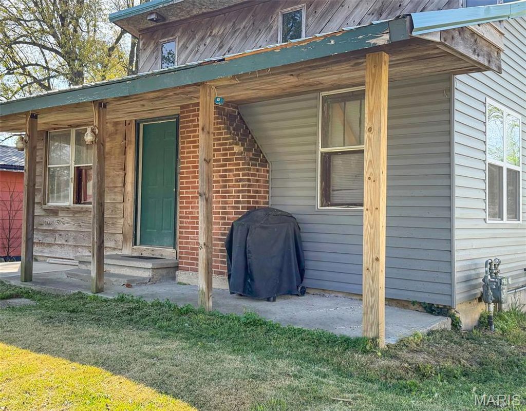 Photo of 1408 Pine Street, Dexter, MO 63841 (MLS # 26021267)