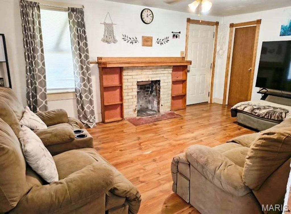 Photo of 1408 Pine Street, Dexter, MO 63841 (MLS # 26021267)