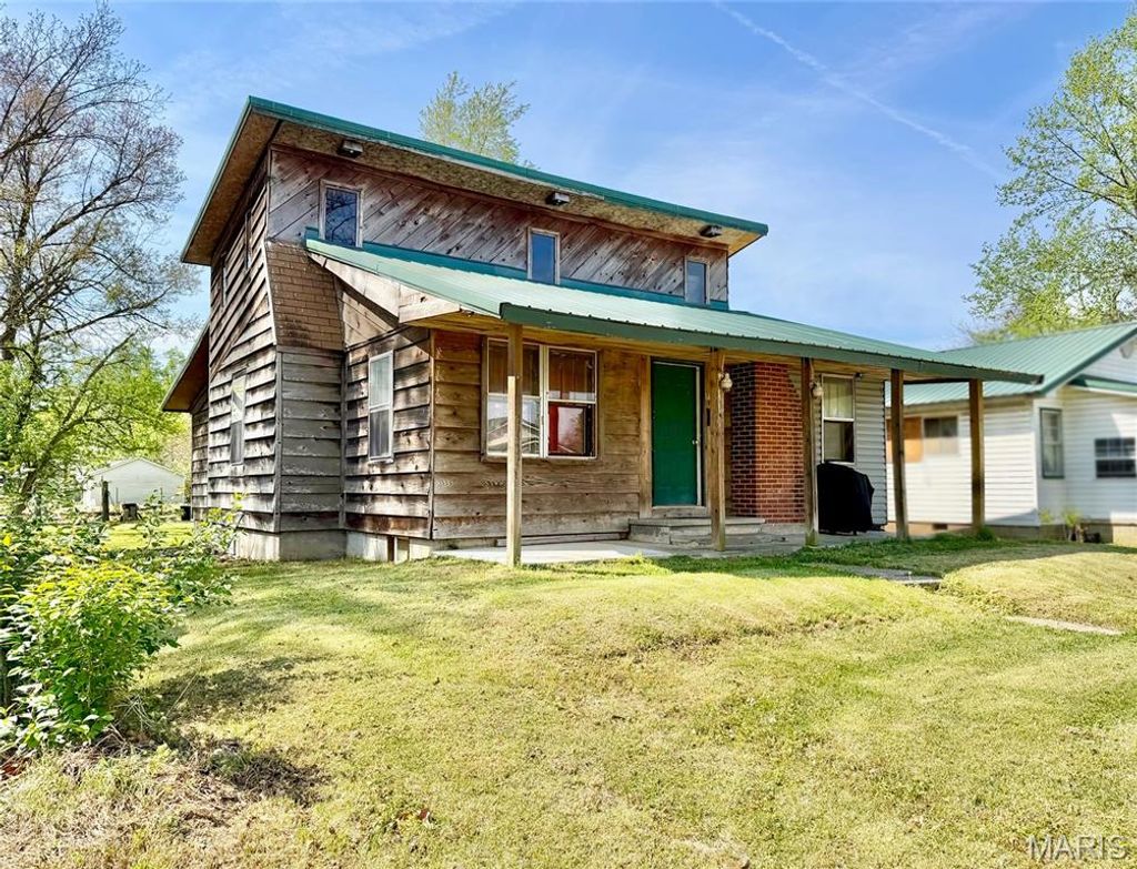 Photo of 1408 Pine Street, Dexter, MO 63841 (MLS # 26021267)