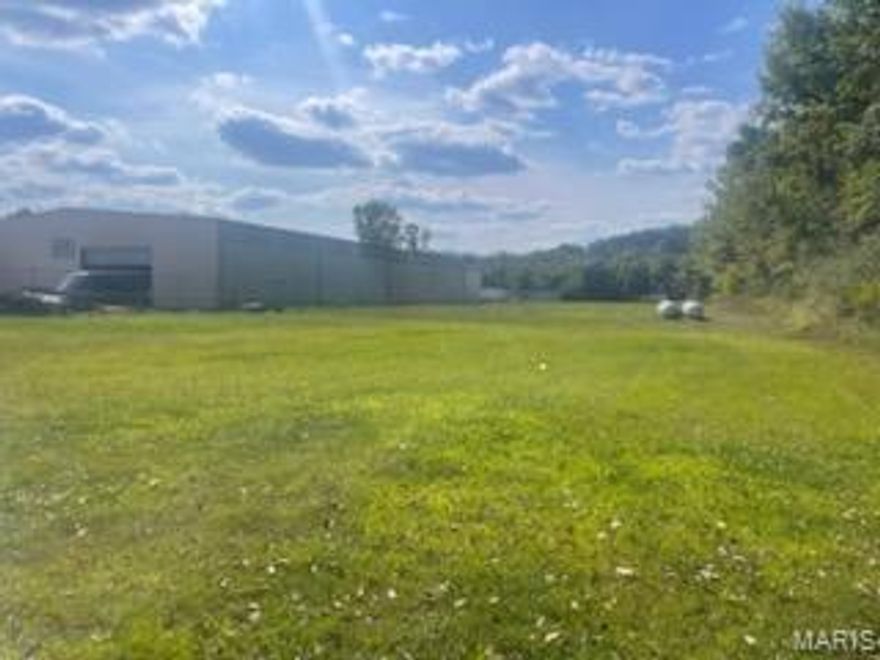 Amazing industrial space perfect for manufacturing, material storage and handling thanks to the dual overhead gantry cranes! With more electric than you could need along with state of the art compressed air system, blast booth and over 24 ft ceilings, this place has it all! The front office has waiting, reception and office areas perfect to greet customers while upstairs has a 1 bedroom apartment that’s very livable for the owner, an onsite manager or security tower to watch over the plant. It could easily be converted to more office space. A lot of the nearly 5 acre property is fenced and gated, offers ample parking and features more level space to either build additional structures like storage or parking for large equipment. This is a rare find!