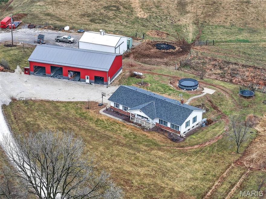 Rare opportunity in a prime Lincoln County location! Situated at the end of a quiet road, this 12.5-acre property offers privacy, functionality, and incredible potential. The 1,500+ sq ft home features vaulted ceilings and abundant windows overlooking gently rolling acreage. Recent updates include renovated primary and guest baths, plus a new mudroom and walk-in butler’s pantry addition ready for finishing (supplies included). Outdoor amenities are exceptional with a brand-new 40X60 shop featuring electric and four bay doors, perfect for hobbies, storage, or workspace. A second 30x40 outbuilding includes three horse stalls, tack room, and barn area—ideal for equestrian use. Major improvements include updated roof, HVAC system, and a whole-house Fire Chief wood stove. The full walk-out basement is roughed in for a bathroom, offering additional expansion potential. And one beautiful pool to overlook the gorgeous setting! This property is priced to allow the next owner to add their finishing touches and create their dream home in an outstanding setting. Professional photos coming soon. Home is selling as-is