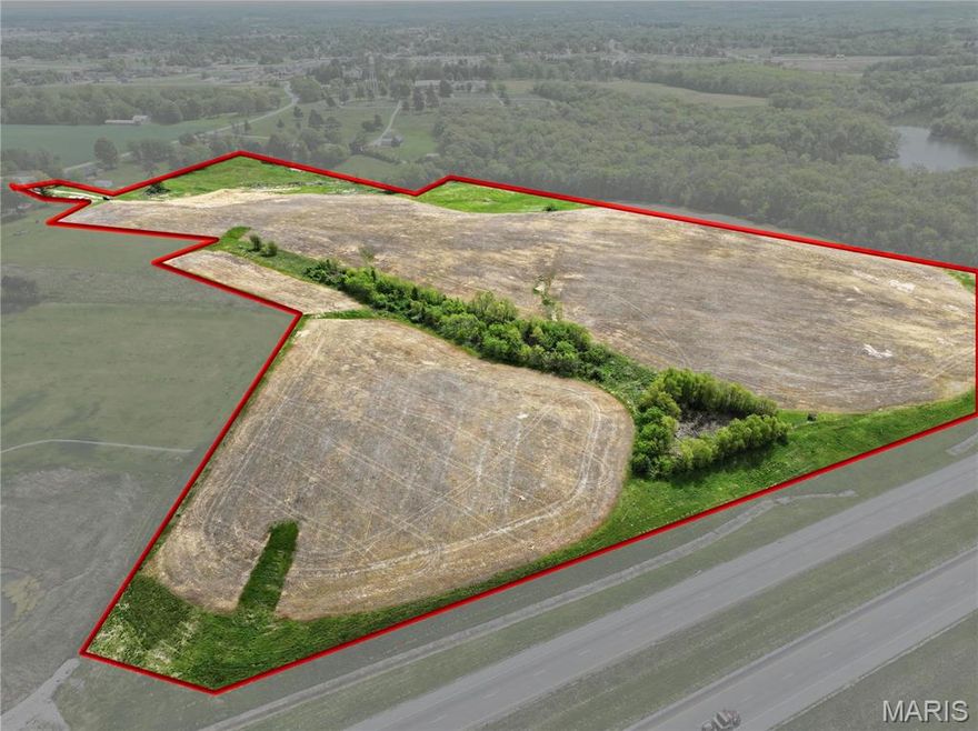 New Listing! Located in the quickly growing city limits of Perryville, MO sits these 36.29 acres m/l. With having approximately 1500 ft of Interstate 55 frontage, allows for a substantial amount of visibility for prime business development. The property is now zoned C2 commercial and has endless potential for whatever kind of business a buyer would like. Utilites are already on site and there is great access to the parcels. The property has been surveyed as a whole and the seller will divide upon a buyer's request. The property is currently in crop production.