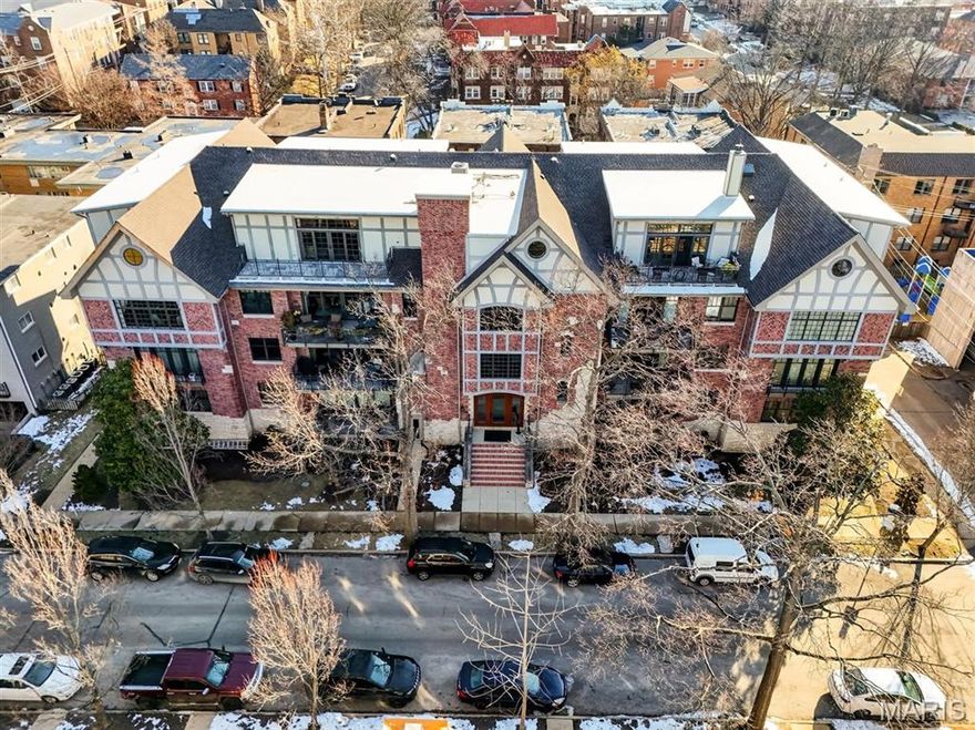 First time on market, Penthouse 4A is perched just above the treetops in one of Clayton’s most exclusive areas.  An extra large living/dining area enjoys a gas fireplace and large front balcony making it perfect for entertaining.  A custom wet bar is cleverly situated off the kitchen and the front hall.  A private den allows for quiet time.  With almost 3000 sq ft, 2 beds, 2.5 baths, separate laundry /utility room, built in desk area and 2large balconies flanking the back and front, make this offering both unique and special in today’s market.  Find windows with west, east and northern exposures and carefully placed skylights throughout filling the unit with light even on a cloudy day.  The bedrm suites each have large walk in dressing rooms/closets with more windows.  The open concept kitchen, breakfast and hearth area is adorned with custom floor to ceiling wood shelving, a gas fireplace and a balcony perfect for a cozy evening dinner or morning cup of coffee.  Some of Clayton’s most coveted restaurants and shops off Wydown Boulevard are just steps away.