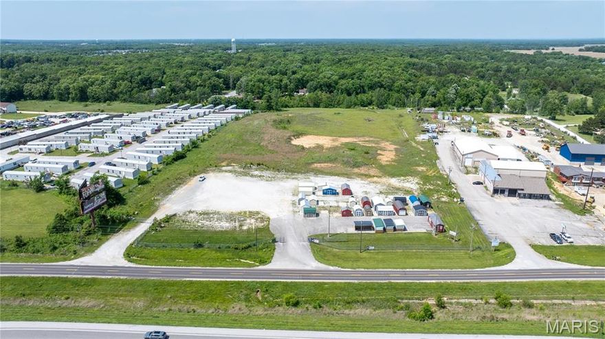Opportunity is Knocking!! Hwy 70 Front Commercial/Industrial Property+ Access to All Utilities=  Endless Possibilities.  Very Few Properties in the area like this one. Nice Visibility to the Highway.  Perfect for all businesses!!!